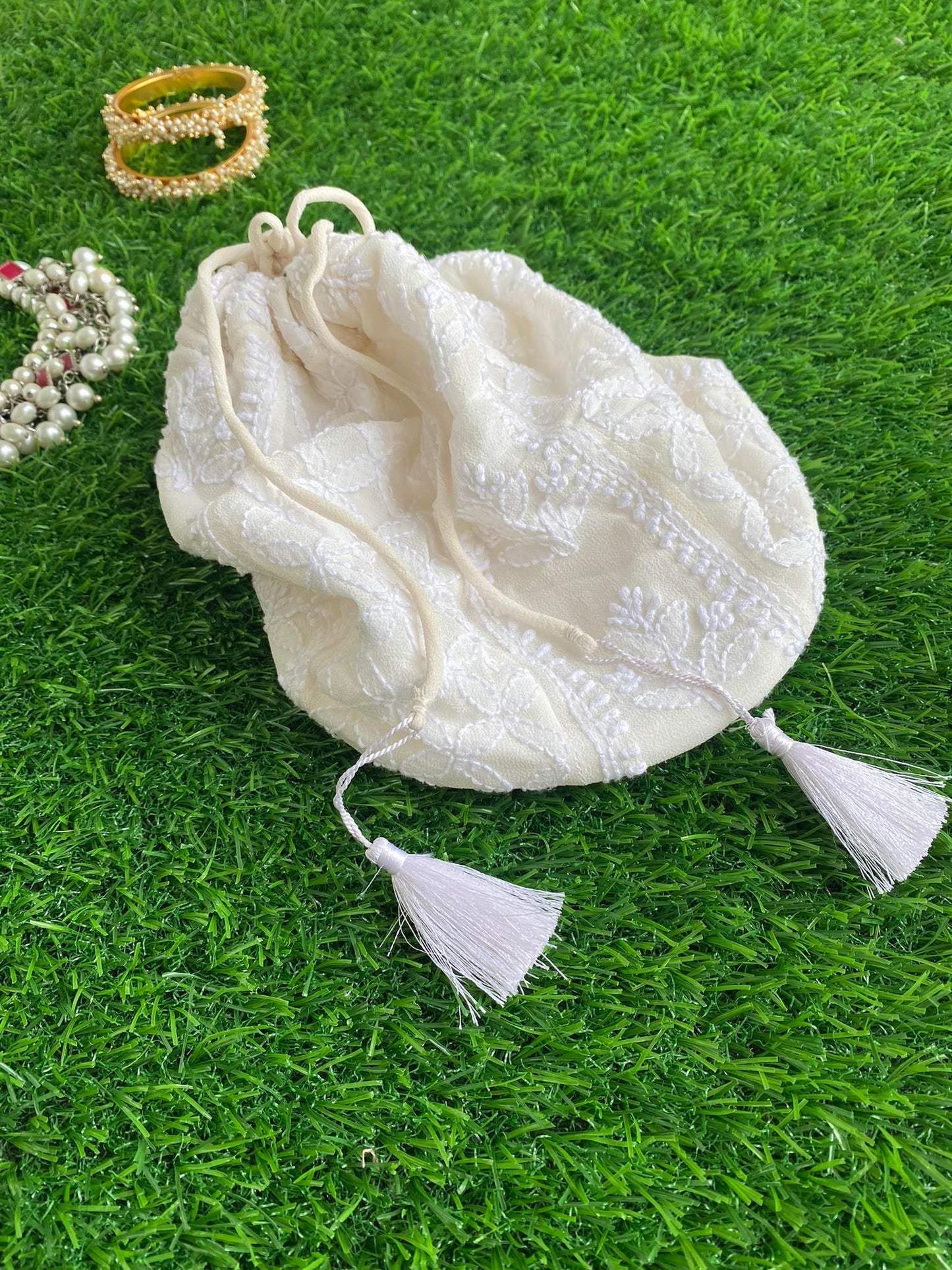 Ivory Chikankari Hand Embroidered Potli Bag