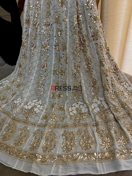 Ivory Heavy Pearl & Mukaish Anarkali Suit Chikankari